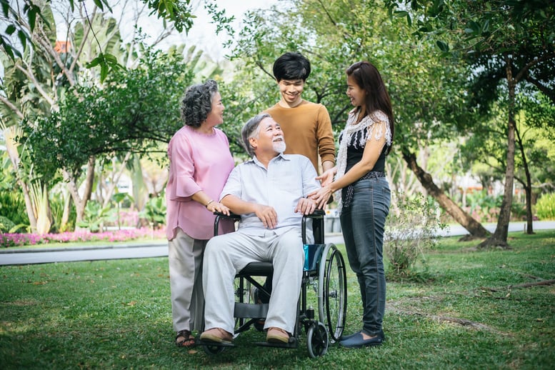 cheerful-disabled-grandfather-in-wheelchair-welcom-2026-01-11-09-26-24-utc