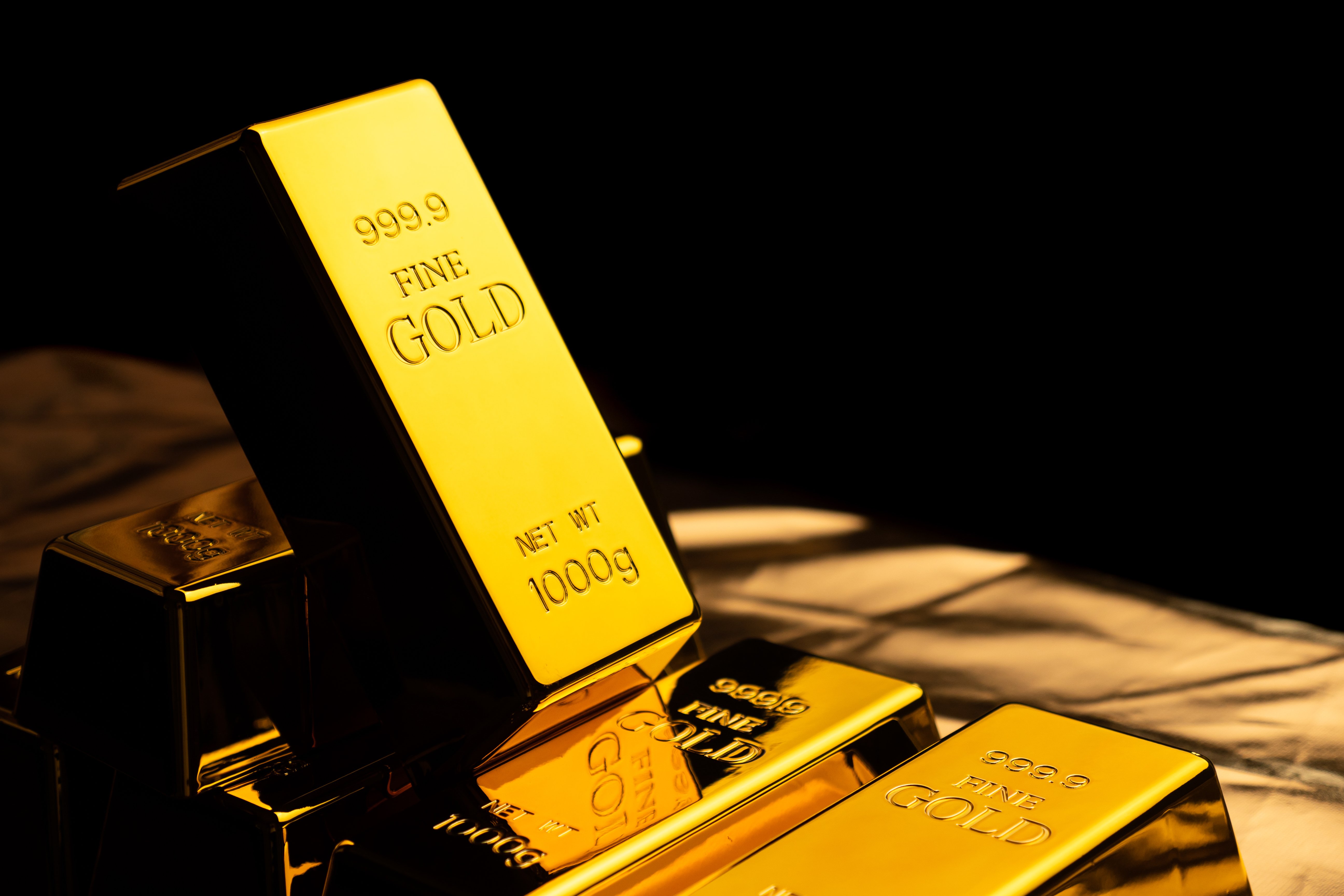 close-up-of-gold-bars-on-black-bacground-financia-2026-01-07-05-41-54-utc