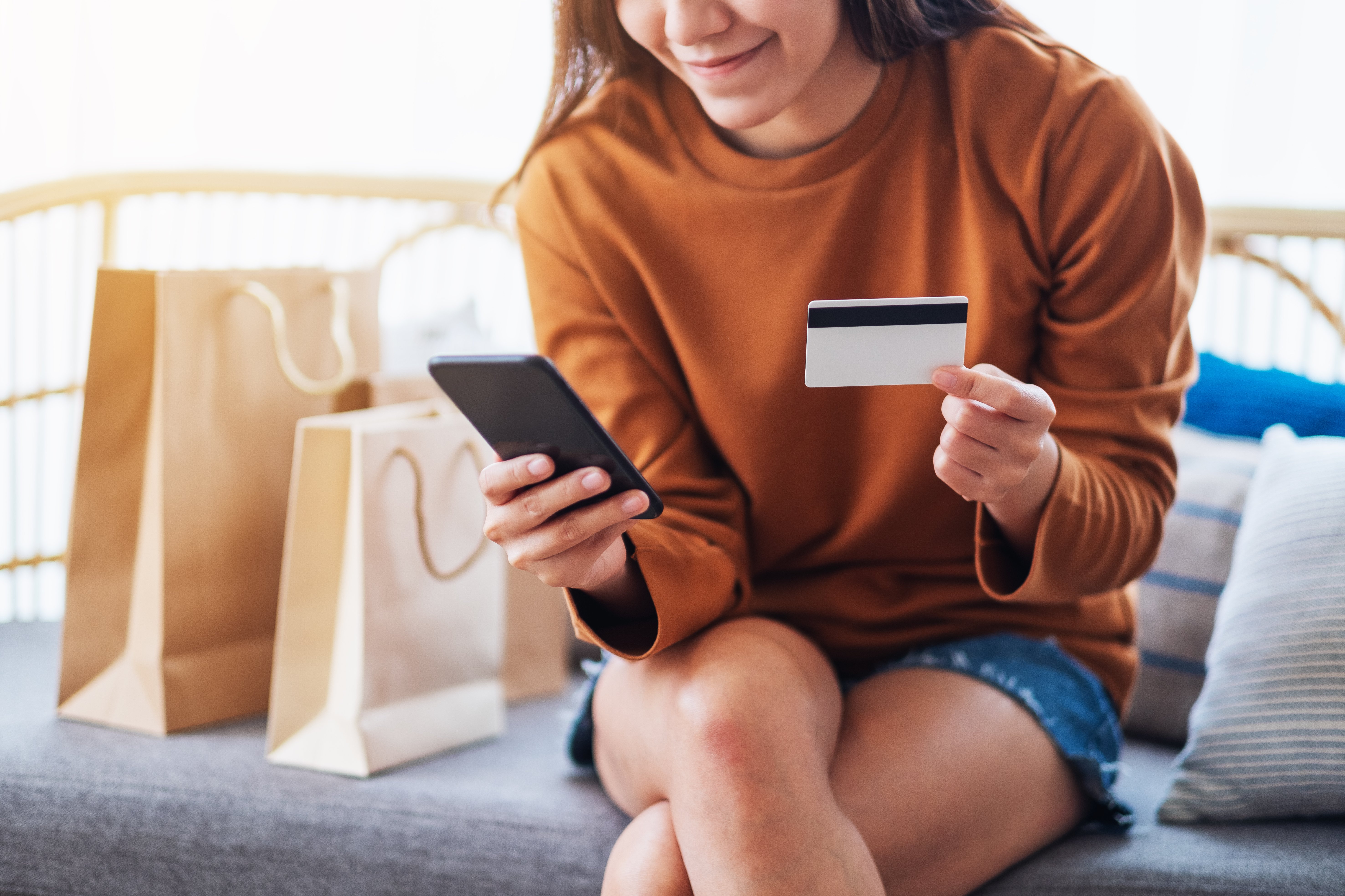 closeup-image-of-a-beautiful-young-woman-using-mob-2026-03-15-23-25-53-utc