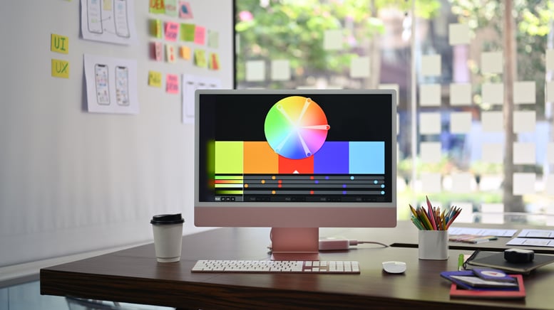 designer-working-desk-with-modern-computer-statio-2026-03-13-05-23-46-utc