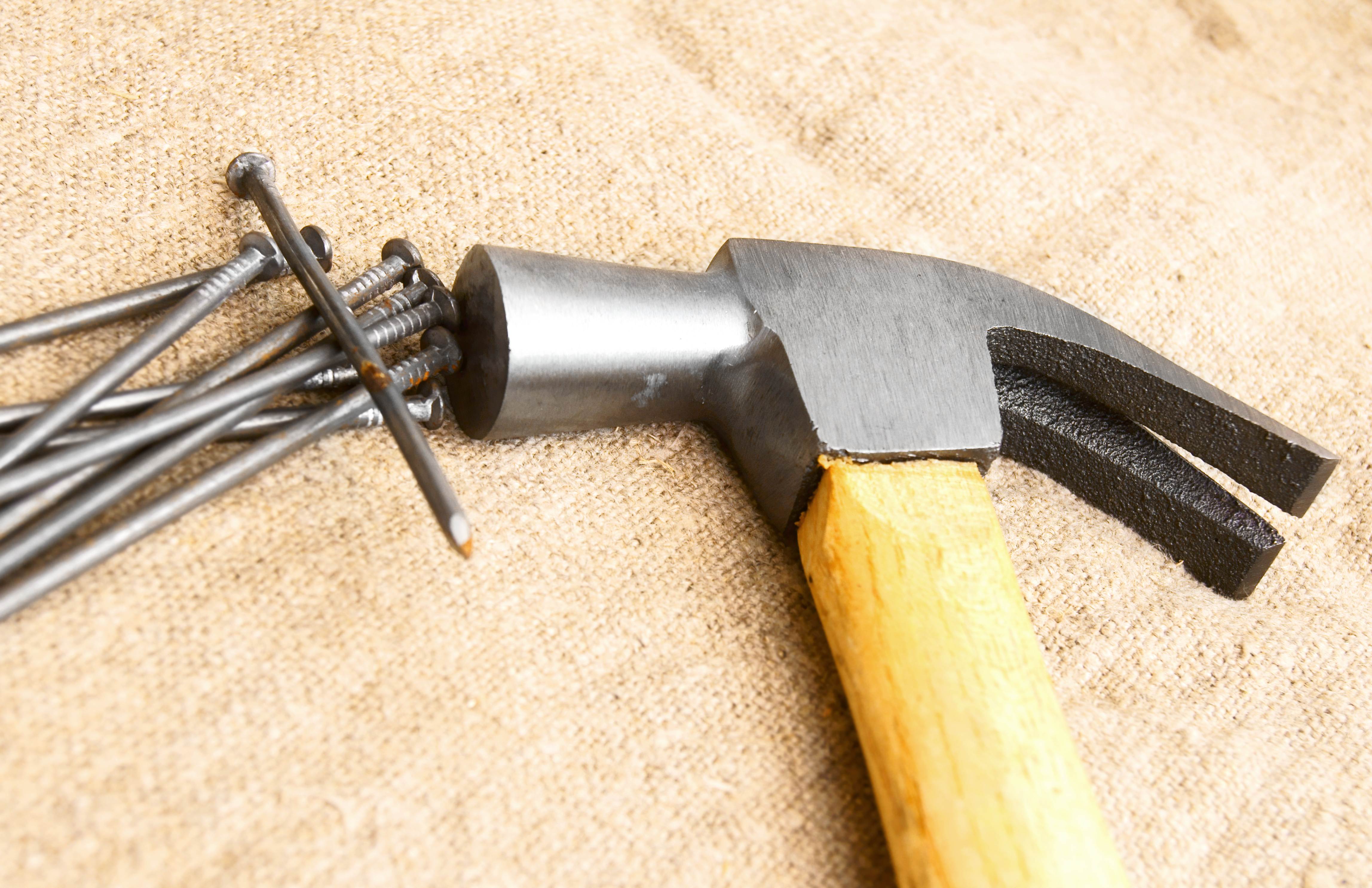 hammer-and-nails-on-a-fabric-2026-01-11-09-59-07-utc
