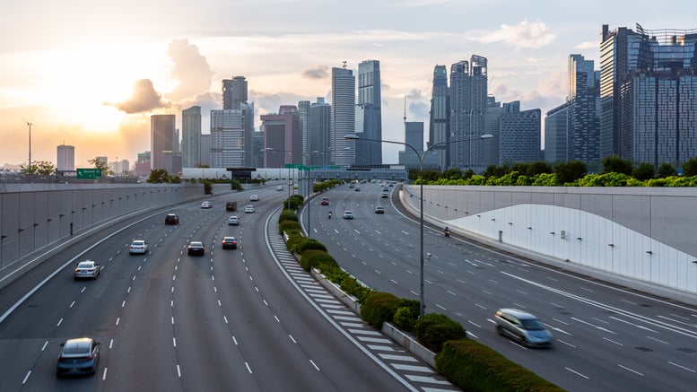 road-with-landmark-buildings-in-singapore-road-to-2026-03-17-04-23-54-utc