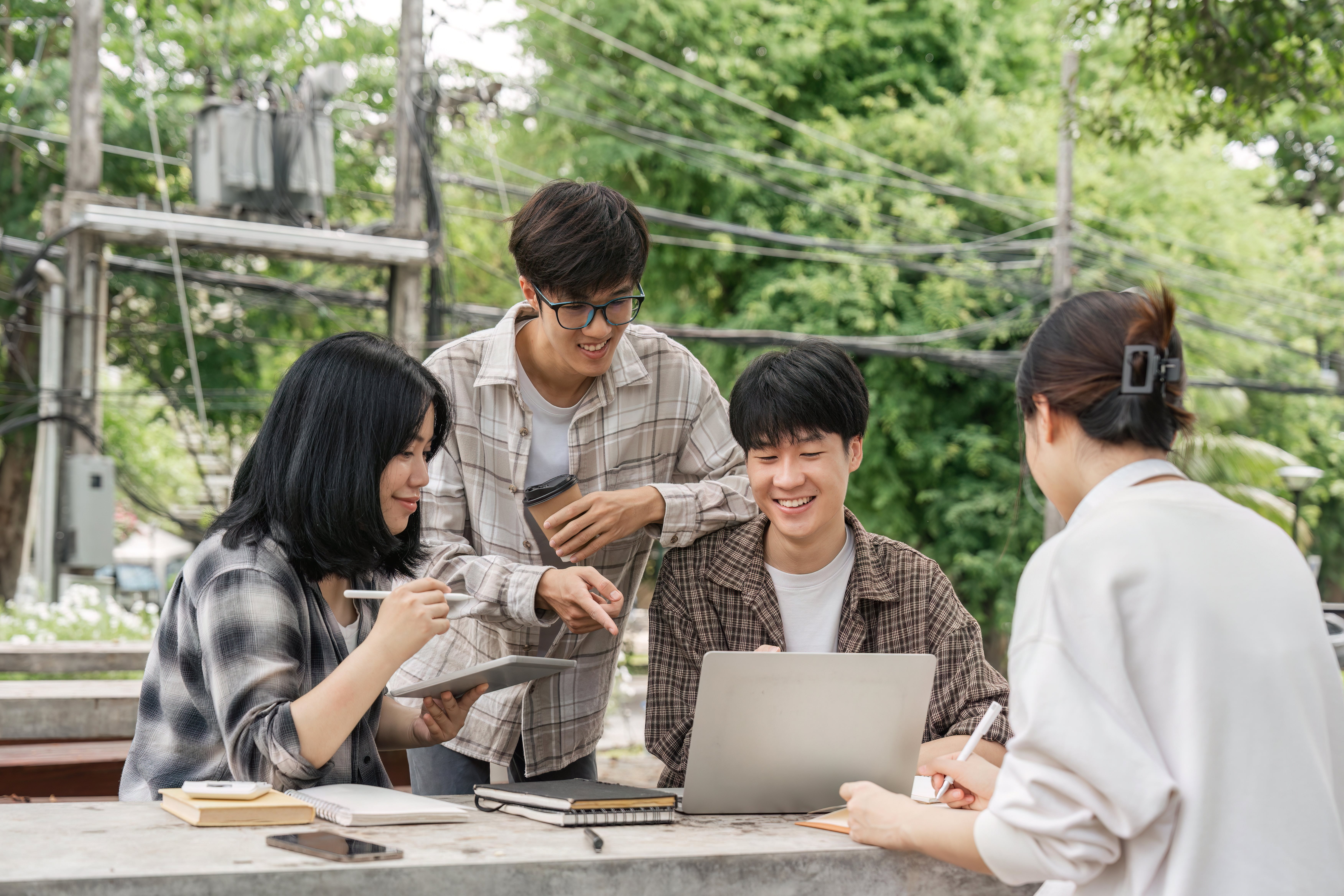 university-students-sitting-together-at-table-with-2026-01-07-00-36-53-utc