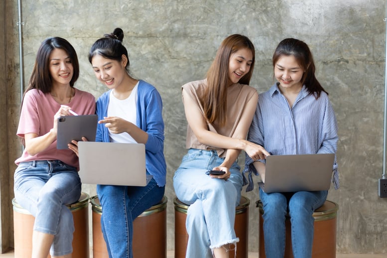 young-people-sitting-together-obsessed-with-device-2026-01-09-01-13-08-utc
